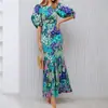 Nueva colección de verano 2026 de ropa europea y americana para mujer para exportación y ventas transfronterizas: vestidos estampados de moda y elegantes con mangas abullonadas