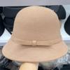 Sombrero de pescador estilo retro Hepburn, elegante sombrero de lana con lazo y cúpula para otoño e invierno, cálido y elegante.