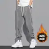 Calça de Moletom Grossa e Pesada com Forro de Lã Outono e Inverno Calças Esportivas Longas Quentes de Inverno para Homens Calças Casuais de Veludo Cotelê Calça de Moletom