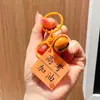 Ganando el Primer Premio: Pequeño Colgante de Regalo para Estudiantes, Anímate para los Exámenes de Admisión a la Preparatoria y la Universidad, Regalo de Graduación para Toda la Clase, Decoración de Mochila, Llavero