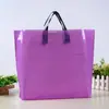 Bolsas de Embalagem para Roupas Atacado Ponto Cor Sólida Bolsas de Mão Plásticas Sacolas de Compras para Presente de Ano Novo LOGO Personalizado