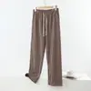 Novas calças xadrez de outono e inverno para mulheres, com cintura elástica estilo americano, forro de fleece escovado duplo e design de perna larga, perfeitas para uso casual