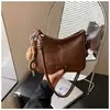 Bolso versátil para el día a día de moda transfronteriza para mujer, bolso de hombro cruzado de moda con textura de cuero encerado, bolso de axila de alta apariencia