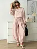 Conjunto Feminino de Duas Peças Estilo Europeu Outono 2026 Venda Quente Blusa de Cor Sólida com Gola Redonda e Manga Ampla e Calça Wide Leg