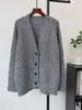 Suéter abrigo largo de punto casual retro holgado adelgazante de otoño e invierno 2026 nuevo cárdigan de punto versátil con cuello en V para mujer
