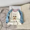 Camiseta infantil listrada de manga longa, algodão puro, fina, com estampa de desenho animado/anime, modelagem solta, estilo coreano, top da moda para crianças pequenas