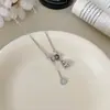Corrente para Clavícula Moeda de Cobre Abóbora Estilo Ins Retrô, Colar Dupla Camada Croissant Laço Levemente Luxuoso, Acessório Versátil e Elegante