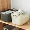 Cesta de almacenamiento de escritorio de imitación de ratán con asa de plástico hueca para artículos varios cesta de almacenamiento de baño para ropa sucia al por mayor