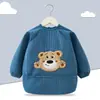 Babero de terciopelo de cristal para bebé, impermeable, antidesgaste, con bolsillo de arroz, para otoño e invierno, delantal para madre y bebé.