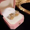 Moda europea y americana simples retro retorcidos pendientes multicapa femeninos aguja de plata s925 celebridad de internet personalizados estilo frío pendientes