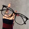 Nuevas gafas de grano de madera de marco grande para adelgazar de aspecto sencillo anti-luz azul grado ajustable espejo plano estudiante retro pequeño libro rojo