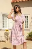Producto Nuevo Transfronterizo 2025 Verano Europeo y Americano Nuevo Vestido de Playa con Estampado de Dobladillo Ancho, Cuello en V, Cintura Alta, Manga Corta, Vestido de Gasa