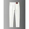 Jeans Elásticos Ajustados de Lujo Ligero Estilo Europeo de Gama Alta Blancos Resistentes al Agua para Hombre, Versión Gruesa para Otoño e Invierno 2026