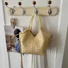 Bolso de textura tejida de nicho para mujer 2026 nuevo estilo moda para ir al trabajo bandolera bolso de mano bolso cubo