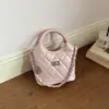 Diseño de Nicho Transfronterizo con un Toque de Alta Gama, Nuevo de Verano 2026 Moda Versátil para el Trabajo Exquisita Bolso Cubo de Hombro Cruzado