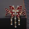 Horquilla de Pedrería Estilo Étnico tamaño pequeño Pinza de Cruz Pinza de Cangrejo Cabeza Trasera Tocados Pinza para el Cabello de Mariposa con Borla Elegante Elegante