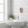 Dispensador de jabón de pared con forma de nariz realista