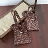 Bolsa Tote de Lona Floral Coreana 2025 Primavera Nova Grande Capacidade Plissada Bolsa Nuvem Moda Feminina Bolsa Transversal