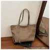 2026 Nuevo Modelo Color Sólido Simple Retro Gran Capacidad Versátil Estudiante Escolar Viajero Casual Bolso de Hombro