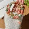 Flor Rara Color Piel Jade-like Material Viejo Bodhi Anillo de Mano Dedo Anular Semilla de Bodhi Suave Wenwan Estudiante Alivio del Estrés Pulsera de Cuentas de Oración Femenina