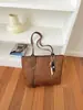 Bolso tejido minimalista transfronterizo para mujer, nuevo y moderno para otoño 2026, de gran capacidad, versátil, para el hombro, tipo tote para la ciudad