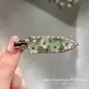 Pinzas para el cabello de pedrería brillante de lujo estilo coreano Dongdaemun Primavera 2026 para mujer, Colección de accesorios para el cabello de la frente
