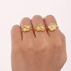 Anillo de flor de cinco hojas con microincrustaciones de circonita transfronteriza europea y americana, de acero inoxidable, con galvanoplastia PVD, resistente al color y ajustable.