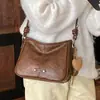 Bolso versátil para el día a día de moda transfronteriza para mujer, bolso de hombro cruzado de moda con textura de cuero encerado, bolso de axila de alta apariencia