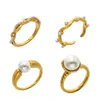 Anillo de Perla Envuelto en Curva Irregular, Acero Inoxidable Chapado en Oro de 18 Quilates, Popular en el Extranjero, Estilo Suave, Elegante Accesorio para la Mano