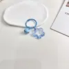 Llavero acrílico colorido con forma de estrella de cinco puntas, colgante para auriculares de dopamina, adorno para bolso de pareja pequeño y fresco.