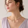 Collar de anillo de perlas largas transfronterizas europeas y americanas para mujer, diseño de nicho de temperamento de corte simple retro, cadena de clavícula