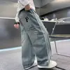 Jeans rasgados para niños con rayas laterales, Nueva colección de primavera 2026 para niños mayores, Pantalones holgados de pierna recta, Tendencia de venta al por mayor transfronteriza