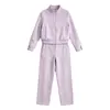Venta al por mayor transfronteriza 2026 Moda europea y americana casual conjunto de chaqueta suelta con cremallera + pantalones para mujer A712249