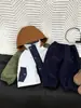 Chaqueta de terciopelo para bebé Otoño e Invierno 2025 Nueva Moda Fresca para Niños Pequeños Chaqueta de Moda Cálida con Capucha y Combinación de Colores