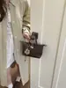 Bolsa feminina transfronteiriça, bolsa de ombro e transversal casual e versátil, nova bolsa quadrada pequena feminina Henggeng, bolsa de palha tecida moderna e fashion