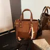 Bolsa Feminina de Camurça Estampa Leopardo Outono Inverno 2025 Nova Casual Design de Nicho Retrô Bolsa de Ombro Transversal Saco