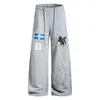 Pantalones deportivos unisex con bordado de unicornio, pantalones de chándal anchos de estilo americano fluidos, pantalones atléticos casuales unisex