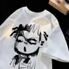 Camiseta de Manga Corta de Algodón Puro con Graffiti Nazha Marca de Tendencia para Hombre Verano 2025 Nueva Camiseta Holgada de Manga Media con Cuello Redondo para Adolescente