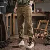 Pantalones de herramientas retro pesados de estilo americano para hombre, primavera y otoño, nuevos pantalones casuales holgados de pierna de color sólido de marca de moda que combinan con todo.