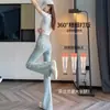 Calças Flared Femininas Inverno 2024 Novo Design de Nicho na Moda Cintura Alta Elástico Visual Fino Calça Jeans Pequena Calça Slip