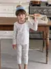 Pijama infantil Anmeiya para niños y niñas, ropa de casa, conjunto de ropa de otoño y pantalones, ropa interior de Lycra, fabricante de ropa interior sin costuras de manga larga