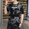 Tamanho grande verão nova manga curta camiseta masculina versão moda solta camisa base masculina meia manga moda fabricantes fornecimento atacado
