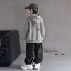 Otoño 2026 Nuevo Sudadera con Capucha Suelta Estampado de Dibujos Animados Retro Americano para Niños Sudadera con Capucha para Niños Moderna