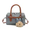 Bolsa de Bowling de Mezclilla Portátil de Verano para Mujer, Nuevo Modelo 2026, Gama Alta, Elegante, Bolso de Hombro y Cruzado de Nicho para Mujer