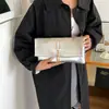 Bolsa de almacenamiento de moda transfronteriza 2026 bolsa de maquillaje portátil bolso de mano de lujo de alto valor bolsa para teléfono brillante moderna