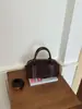 Bolsa de bolos estilo coreano para mujer, nueva colección 2026, bolso de hombro simple y moderno, bolso cruzado de nicho y alta calidad, moderno