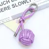 Llavero Colgante Bola Trenzada de Cordón de PU Creativo Elegante Simple Anillo para Llave de Coche Colgante para Bolso de Hombre y Mujer