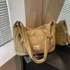 Bolsa de Algodón de Gran Capacidad para Chaqueta Mujer 2026 Nueva Bolso de Hombro Único de Alta Textura Bolso Cruzado Versátil para Viajes Diarios Bolso de Mano