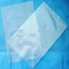 Material de tubo de PE alto y bajo presión transparente bolsa pasante impresión boca plana rollo de película de embalaje de plástico película de tubo largo fabricante