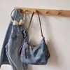 Colección de otoño 2026 transfronteriza: bolso de hombro elegante y de alta calidad, bolso tote retro, moderno y visualmente atractivo, gran capacidad, mochila casual